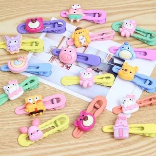 VĨ 2 KẸP MÁI SẮT ĐÍNH CHARM MIX NGẪU NHIÊN MS1040