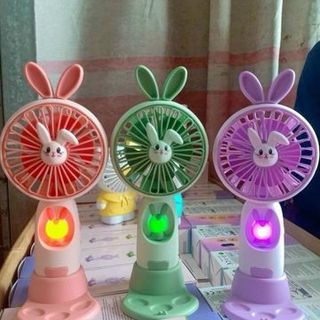 QUẠT TÍCH ĐIỆN CẦM TAY CÓ GIÁ ĐỠ TAI THỎ MS 1011