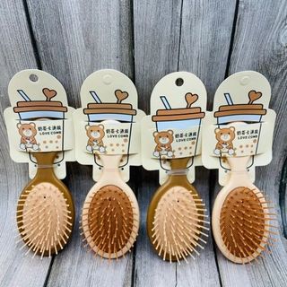 LƯỢC MATXA MINI GẤU NÂU