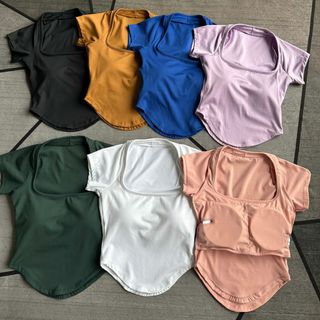 Hàng mới về Áo croptop cổ vuông vạt bầu Thiết kế có bo chun ôm ngực tốt Chất thun poly co giãn . Có khe nhét mút , vải dày dặn S M L