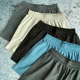 Quần đùi chạy bộ 2 lớp đục lỗ Phom chất chuẩn đẹp Size Ri 2222 Tách nửa ri được