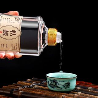 Chai thủy tinh đựng rượu tròn trơn nắp bi cam 500ml