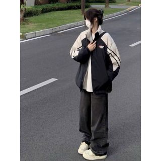 Áo khoác dù phối màu ,logo thêu. Chất dù xịn 2 lớp , có 2 size l và xl , thun lai .