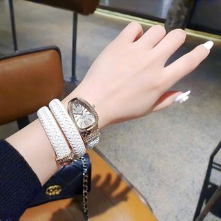 ĐỒNG HỒ NỮ TRUNG CẤP B V L RẮN DÂY LƯỚI NHỰA