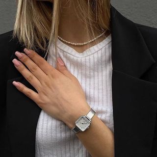 ĐỒNG HỒ MÁY NHẬT NỮ D.W LƯỚI MẶT VUÔNG CÓ TEM KÍCH HOẠT BẢO HÀNH ĐIỆN TỬ 2
