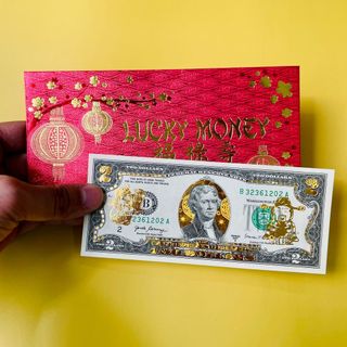 Tiền 2 đô mạ vàng thần tài, lì xì Tết. giá sỉ - giá bán buôn