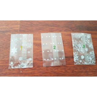 Bịch 100 túi đựng bánh kẹo  hình bông tuyết size 7x10cm