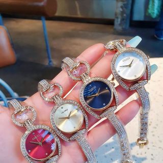 ĐỒNG HỒ NỮ THỜI TRANG GU CII LẮC MỚI
