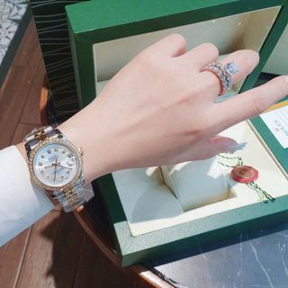 ĐỒNG HỒ NAM NỮ CAO CẤP RÔ LE DÂY THÉP MẶT KÍNH SAPHIRE VIỀN ĐÁ 6