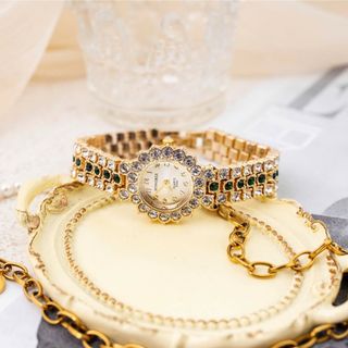 Đồng hồ lắc tay nữ Hongrui 0013819 mặt tròn đeo tay thời trang