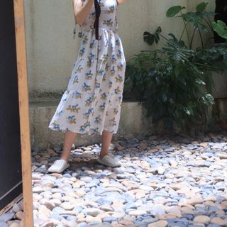 Đầm Xoè Nữ Bae Nhiều Tầng Cột Nơ Vai Họa Tiết Hình Thú Xinh Xắn