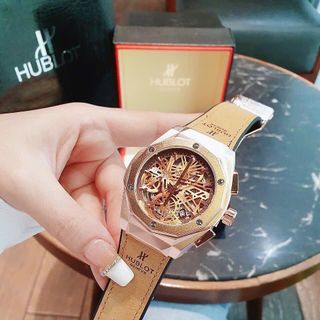 ĐỒNG HỒ NAM TRUNG CẤP HOT TREND HUBL MẶT TRÒN GIẢ CƠ DÂY DA