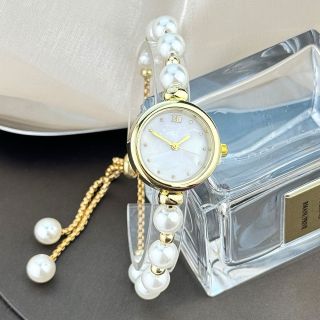Đồng hồ đeo tay ngọc trai dây rút mặt xà cừ sang xịn, phong thuỷ với ngọc trai sang trọng ( Hàng Giá Tận Xưởng )