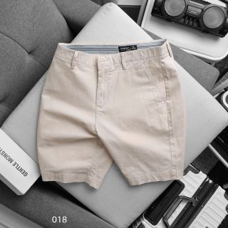Short kaki nam. Chất thun co giãn. Dài vừa chấm trên gối