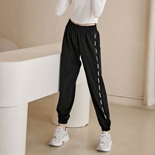 Quần jogger dù nữ dây nik túi 2 bên mới Phom chất chuẩn đẹp Size m.l.xl.xxl Ri 2222 Tách nửa ri được