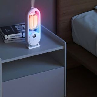 Máy Xịt Thơm Phòng Tự Động