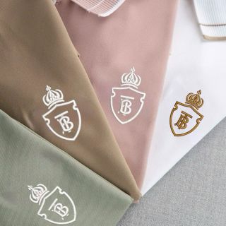 Áo thun cổ bẻ thêu logo mới 2025