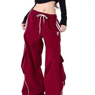 Quần Yếm Hip Hop Cổ Điển Kiểu Mỹ Ống Rộng Cạp Cao Năng Động Tôn Dáng Mùa Hè Cho Nữ 
Quần dây rút lai đường chỉ decan sọc viền.