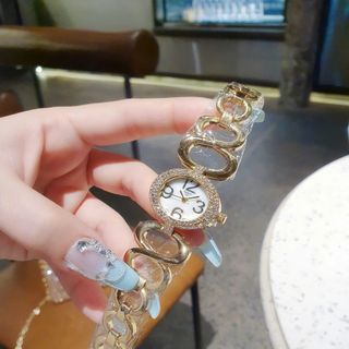 ĐỒNG HỒ NỮ THỜI TRANG TISỚT DÂY LẮC MẶT OVAN VIỀN HỘT