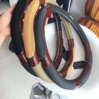 Bọc vô lăng thiết kế tinh tế phù hợp với nội thất xe, bọc da tay lái bảo vệ vô lăng nhiều màu sắc...