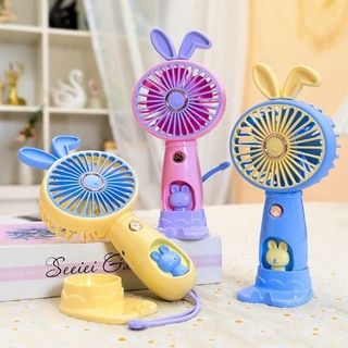 Quạt Tích Điện Tai Thỏ Có Đế Bàn Chân Chó (Thùng 150 Cái)