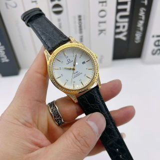 Đồng hồ Omega máy pin dây da viền đá