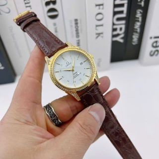 Đồng hồ Omega máy pin dây da viền đá