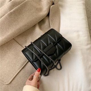Túi xách nữ khoá nhọn