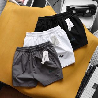 Short lacost xi giãn runing dày dặn mịn mát , nhẹ tênh, trơn láng, co giãn 4 chiều, 3 túi khoá kéo, logo dạ quang Phom ngắn trên gối Size : m l xl 2xl /2222/8c 3 màu / ri 24c