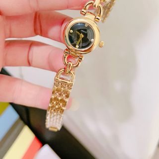 Đồng hồ nữ caochss lắc nhí