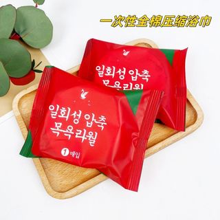 GÓI KHĂN TẮM NÉN TÚI ĐỎ