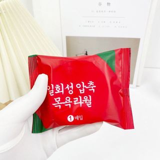 GÓI KHĂN TẮM NÉN TÚI ĐỎ
