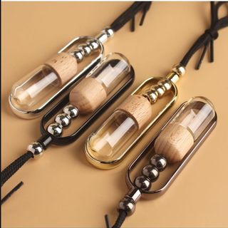 2025 cung cấp đặc biệt xuyên biên giới 10ml chai hương liệu mặt dây chuyền tròn nhỏ chai tinh dầu chai nước hoa đồ trang trí mặt dây chuyền xe hơ