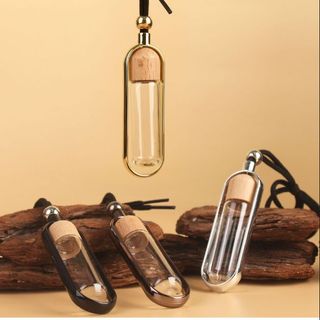 2025 cung cấp đặc biệt xuyên biên giới 10ml chai hương liệu mặt dây chuyền tròn nhỏ chai tinh dầu chai nước hoa đồ trang trí mặt dây chuyền xe hơ