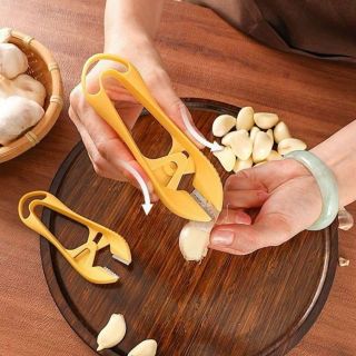 Dụng Cụ Bóc Vỏ Tỏi Thép Không Gỉ Bóc Tỏi Tiện Lợi Nhanh Chóng giá sỉ