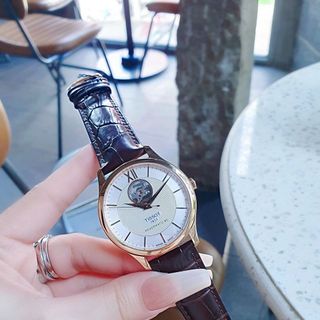 ĐỒNG HỒ NAM CƠ SIÊU CẤP THUỴ SỸ TISỚT DÂY DA KÍNH SAPHIRE LỘ MÁY MẶT TRẮNG VIỀN ĐỒNG