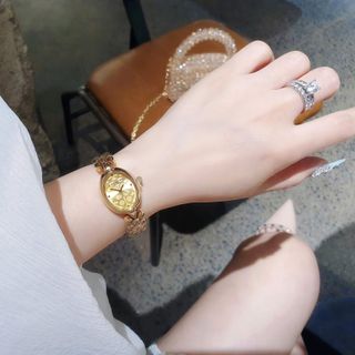 SALE BỎ MẪU ĐỒNG HỒ NỮ THỜI TRANG COAT LẮC MẶT OVAN HOA VĂN