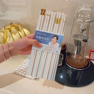 BỘ ĐŨA HỢP KIM TRẮNG VIỀN VÀNG