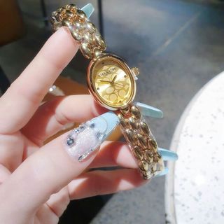 SALE BỎ MẪU ĐỒNG HỒ NỮ THỜI TRANG COAC LẮC MẶT OVAN HOA VĂN