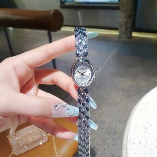 SALE BỎ MẪU ĐỒNG HỒ NỮ THỜI TRANG COAC LẮC MẶT OVAN HOA VĂN