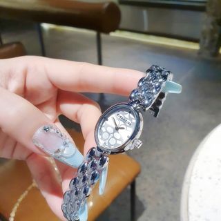 SALE BỎ MẪU ĐỒNG HỒ NỮ THỜI TRANG COAC LẮC MẶT OVAN HOA VĂN