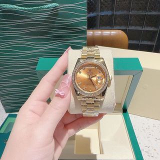 ĐỒNG HỒ NAM CAO CẤP RÔLE MÁY CƠ DÂY THÉP MẠ PVD VÀNG VIỀN ĐÁ