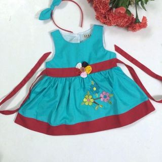 472 Đầm bé gái thêu bông kèm cài. Ri 8