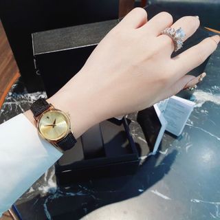 SALE BỎ MẪU ĐỒNG HỒ NAM NỮ TRUNG CẤP MOVAĐÔ DÂY DA ĐEN