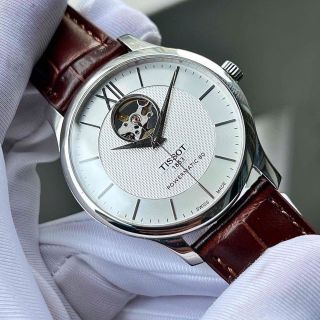 ĐỒNG HỒ NAM CƠ THỤY SĨ TISỚT DÂY DA KÍNH SAPHIRE LỘ MÁY MẶT TRẮNG VIỀN BẠC