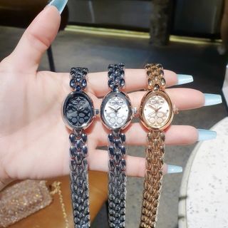 SALE BỎ MẪU ĐỒNG HỒ NỮ THỜI TRANG COATH LẮC MẶT OVAN HOA VĂN