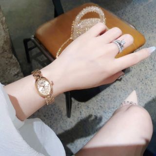 SALE BỎ MẪU ĐỒNG HỒ NỮ THỜI TRANG COATH LẮC MẶT OVAN HOA VĂN