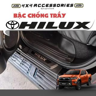 Ốp Bậc Cửa Xe, Dán Bậc Lên Xuống Xe Ô Tô Toyota Hilux 2015 - 2025 Phụ Kiện Bán Tải Nhựa ABS Cao Cấp Chuẩn Form