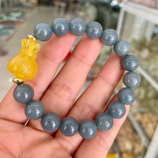 Vòng tay lam ngọc 10 li mix túi tiền hổ phách