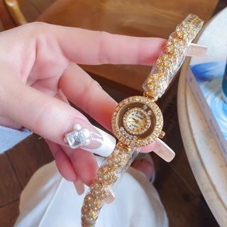 SALE BỎ MẪU HÀNG XI ĐỒNG HỒ NỮ THỜI TRANG TRANEL DÂY MẶT HOA VIỀN HỘT 4989